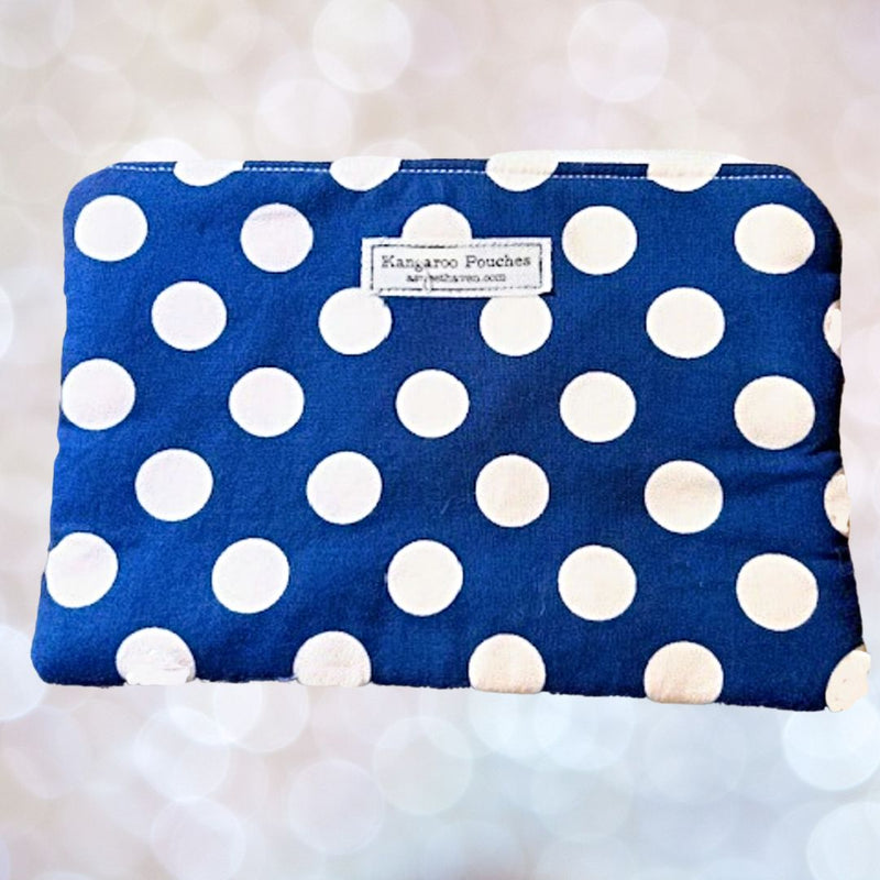 This 9" x 6" Blue with White Polka Dots Multipurpose Zipper Bag " Kangaroo Pouch" is the perfect size to fit in your purse.