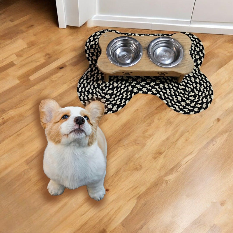 Our Black and Cream Bone Shaped Braided Rug will give your kitchen a pop of color . 14" x 17.5" Made in Maryland.