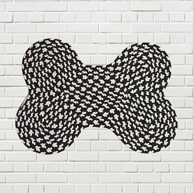 Our Black and Cream Dog Bone Shaped Rug is 14 in by 17.5 in. Purchase online at harvestarray.com.