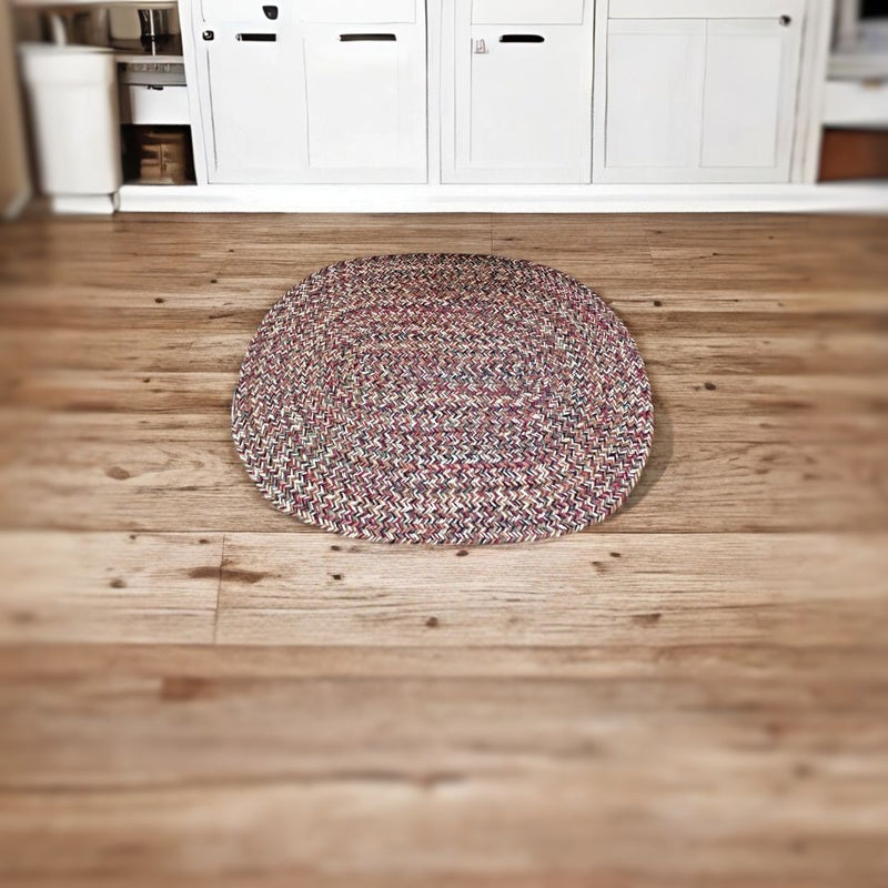 Keep your feet warm on cold days when doing dishes or brushing your teeth when standing on a pretty, soft, and durable Braided Oval Rug from Harvest Array.