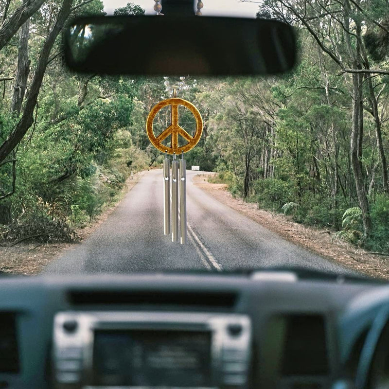 Return to Zen and take a drive in nature with peaceful notes of our Peace Sign Car Chime from Harvest Array.