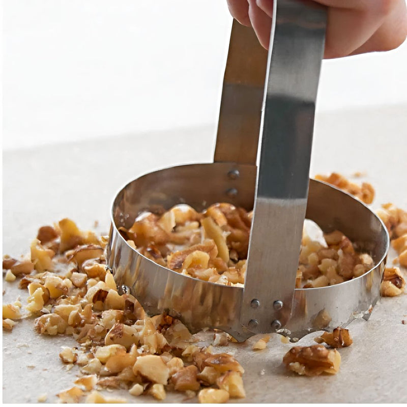 Put away the messy, bulky food processor and use our Serrated Food Chopper from Rada Cutlery. 