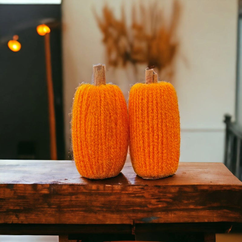 Small Orange Yarn Pumpkin with Cinnamon Stick Stem fall decoration.