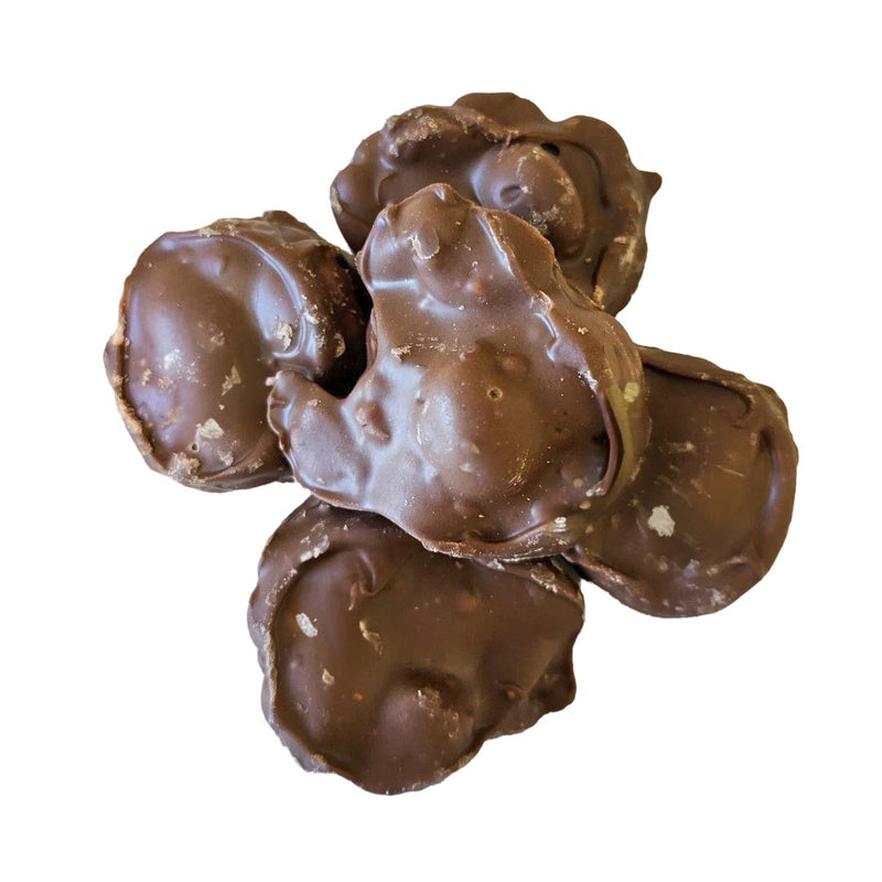 The great combination of chocolate and peanuts of these Chocolate Peanut Clusters make yummy holiday treats to share, from Harvest Array.