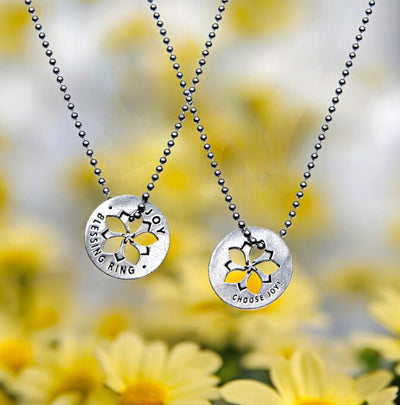 Put our Joy Blessing Ring Charm on a chain and wear it as a necklace (Chain shown is Not included.)